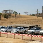 Área de encenação da Paixão de Cristo em Planaltina com barreiras e viaturas de segurança do GDF.